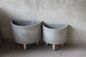 matching semicircle concrete pots suitable to join together or place agianst a wall with legs